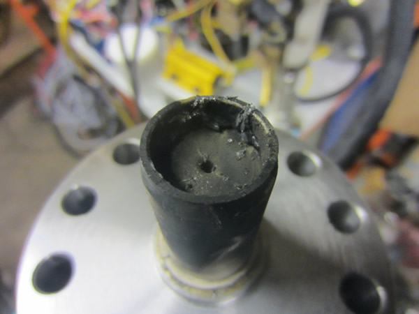 7kJ Exploding Wire Aluminium residue, carburised PEEK insulator